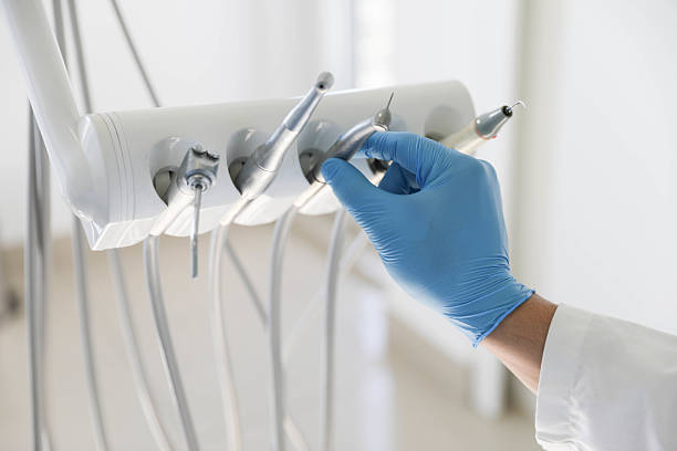 Professional Root Canal Treatment technician working in Addis, LA